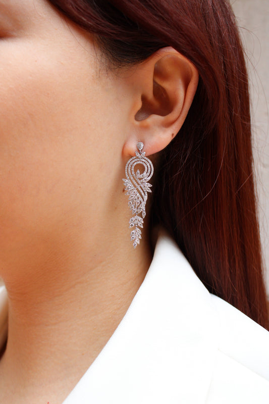 Aretes colgantes con diamantes