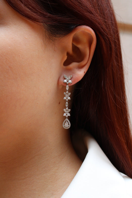 Aretes largos como flor