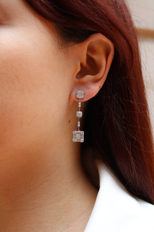 Aretes colgantes con diamantes