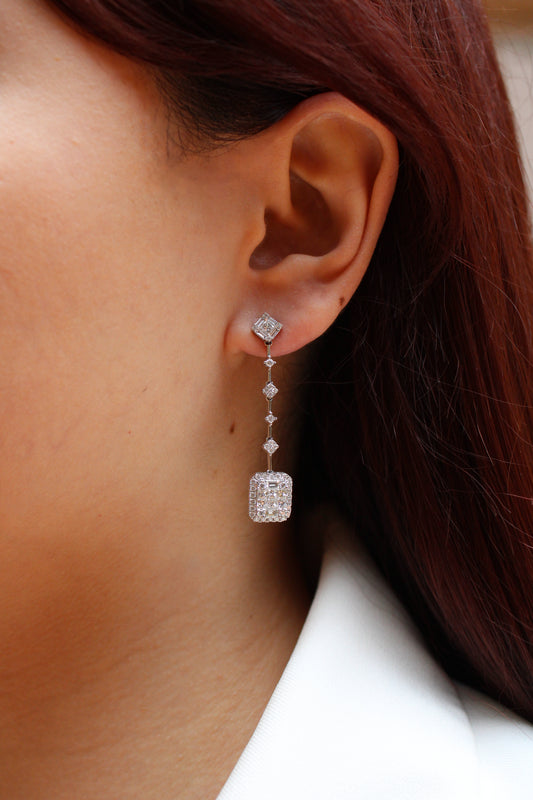 Aretes colgantes con diamantes